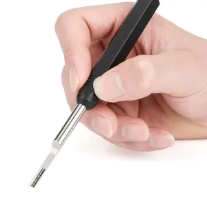 16A contact removal tool in hand